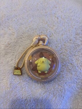 Sanrio Pompompurin Dome Bag Charm in Pale Yellow and Cream